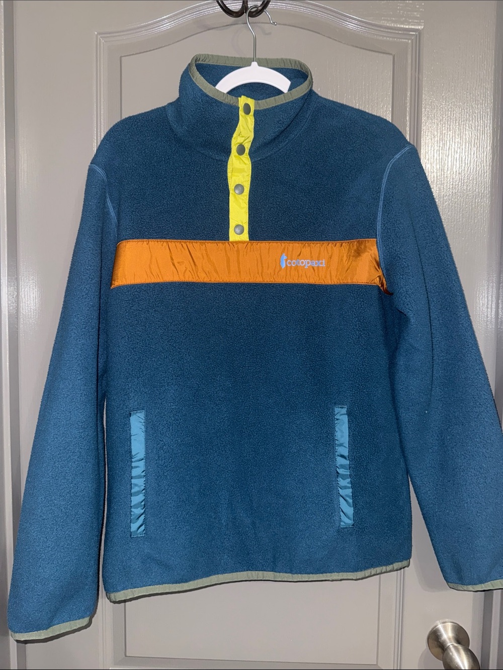 cotopaxi Teal Pullover Fleece with Orange Chest Stripe and Yellow Placket